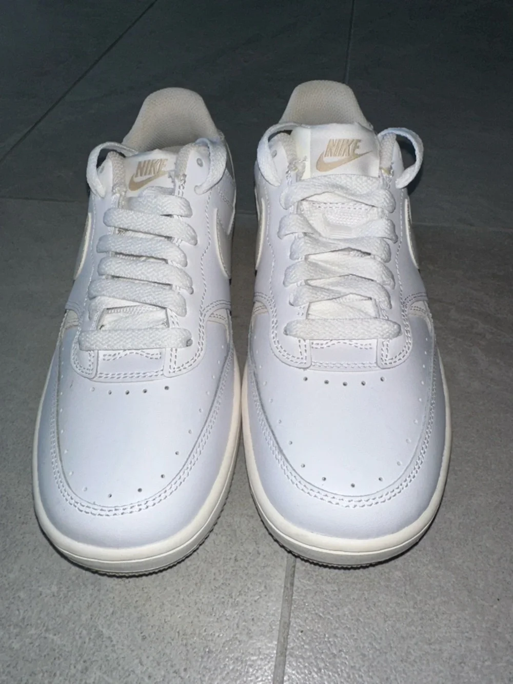 Nike White Sneakers with Cream Swoosh and Gum Outsole
